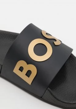 BOSS BAY IT SLID UNISEX - Chanclas De Baño - Black/gold, Unisexo 11 BOSS BAY IT SLID UNISEX - Chanclas De Baño - Black/gold, Unisexo -Outlet BOSS Tienda cfdaef9311af49f387d184fb971adb17